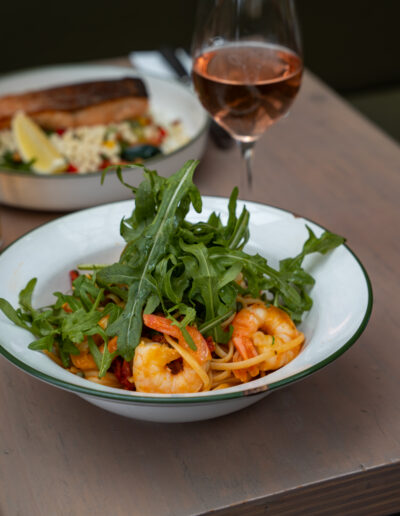 PRAWN LINGUINE 36 rich prawn bisque, sun-dried tomatoes, confit garlic, wild rocket, capers (ldo, i)