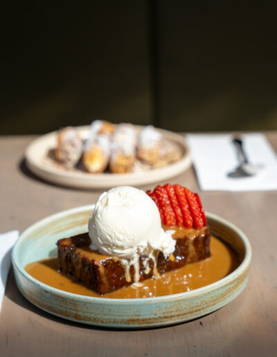 STICKY DATE PUDDING 15 butterscotch sauce & vanilla ice cream (v)