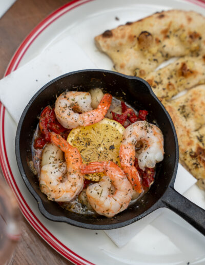 WOODFIRED SCALLOPS & PRAWNS 22 house flatbread, sun dried tomato, sicilian lemon & dill butter, crispy capers (lgo, i)